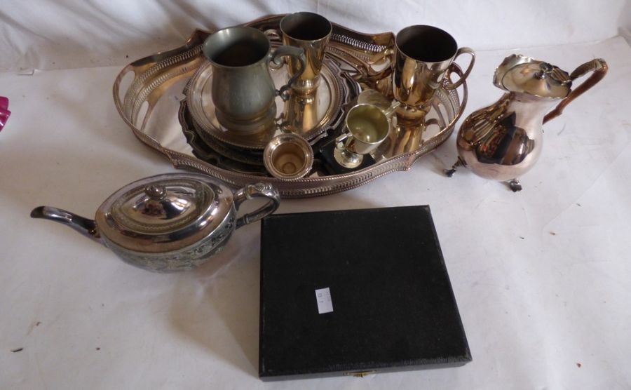 A plated oval gallery tray, various plated salvers, hot water jug and a set of fish knives and