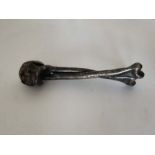 C 1900 Skull and Cross Bones Nutcracker RD740410. Approximately 16cm long.