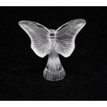 Lalique - A boxed moulded glass Butterfly paperweight, along with Lalique pamphlet. Signed Lalique