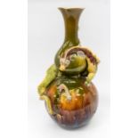 Burmantofts: A large double gourd faience dragon vase with entwined dragon around body and floral