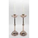 WMF: A pair of Jugendstil silver plated candlesticks with ball centred square form stems leading