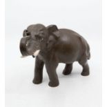 Royal Doulton - A 1930s' matte glazed elephant with detailed design, marked to underneath of foot.