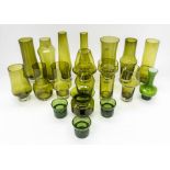 A collection of fifteen Finnish Riihimaki green glass vases of various shapes and sizes - largest
