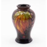 Moorcroft Miniature flambe leaf & berry pattern vase of Baluster form circa 1930