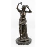J Ulrich - A 20th Century Austrian Art Deco bronze figure of a nude lady perching by rock side, with