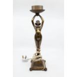 A Banksway Art Deco bronzed metal figurine of nude displaying lamp fittings, on square Deco base.
