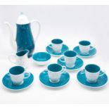 Susie Cooper - A six setting coffee service in a blue polka dot design, consisting of cups, saucers,