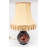 Moorcroft Pottery: A Moorcroft Pottery Pomegranate pattern lamp base and shade. Height of lamp