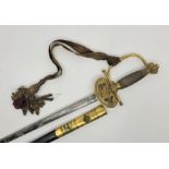 A Victorian officer's dress sword and scabbard, having 78.3cm finely etched steel blade engraved