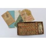 An early 20th century Mah Jong with bamboo tiles and bone sticks, in original card box with