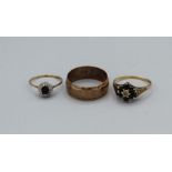 Three 9ct gold rings. Comprising a sapphire and diamond halo ring, size L, a sapphire and diamond