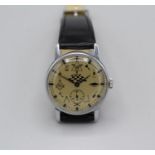 Masonic interest: A mechancal wristwatch in a stainless steel case on a leather strap. Baton