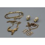 A selection of yellow metal jewellery comprising a pair of 9ct gold cultured pearl earrings (