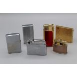 A collection of cigarette lighters to include a vintage Zippo lighter, a Rolstar, a Calibra