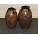 A late 20th century stoneware garden vase, decorated in relief with a dragon, 53cm, together with