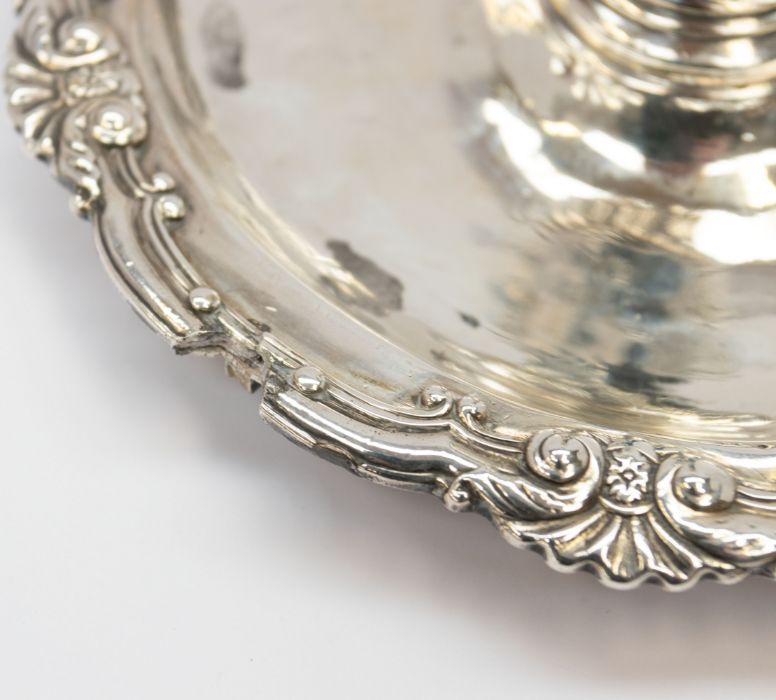 A George III silver chamberstick, the detachable sconce with foliate scrolls, above a waisted and - Image 9 of 9