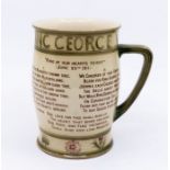 A William Moorcroft commemorative mug for King George and Queen Mary with four printed chorus verses