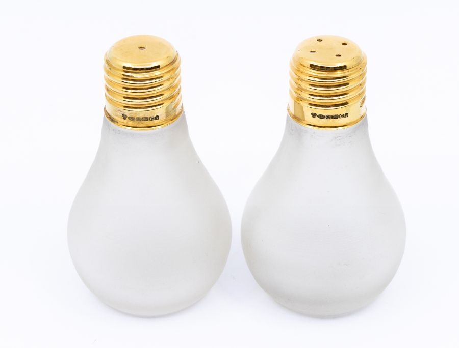 A pair of Queen Elizabeth II silver gilt novelty salt and pepper shakers, in the form of lightbulbs,