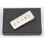 A silver money clip, feature hallmark for 2023, approx 16GMS, approx 5.1CM • A new commemorative