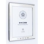 A silver photo frame, 8" x 6", with feature hallmark for 2023 • A new commemorative mark has been