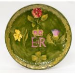 A Moorcroft for Liberty commemorative plate, celebrating Queen Elizabeth II's silver jubilee, tube