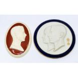 A Royal Worcester circular wall hanging plaque commemorating the coronation of King George VI and