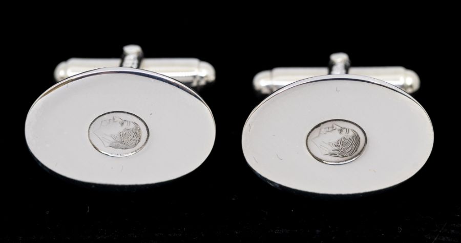 A pair of silver oval cufflinks / cuff links, T-bar post, approx 11gms, approx 2cm, feature hallmark