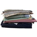 A quantity of vintage Laura Ashley and Liberty fabrics including good sized lengths and fat