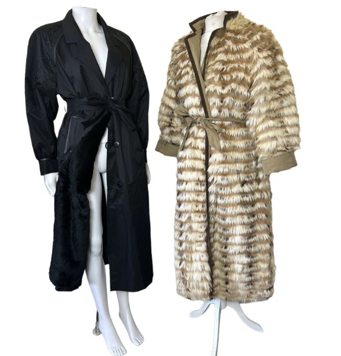 three vintage fur lined macs, one with a grey fox collar, and one being reversible with one side