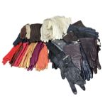 39 pairs of women's leather and kid gloves in a variety of colours and styles (qty)