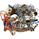 A quantity of antique and vintage costume jewellery to include amber and rose quartz chips,