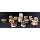 Seven Halcyon Days enamel circular Christmas boxes, various dates, two others, a Halcyon Days enamel