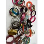 Two bags of vintage and contemporary bangles and b