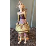 Artist Cloth 16’ Painted stockinette dressed doll on chair-artist vintage made piece., dressed in