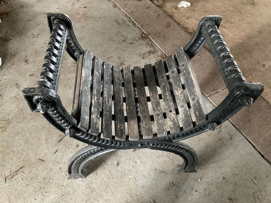 Victorian A 19th century Coalbrookdale X-frame garden seat, wooden slats on curved heavy iron