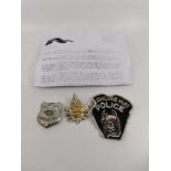 Three "Medicine Hat" Canadian police badges. Comprising a fabric patch. a maple leaf hat badge and a