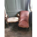 An upholstered Victorian nursing chair with cabriole legs together with a Victorian two armed