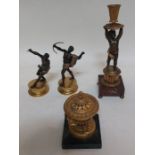 A pair of small standing bronze archers on metal bases , one is loose on the stand, A taller
