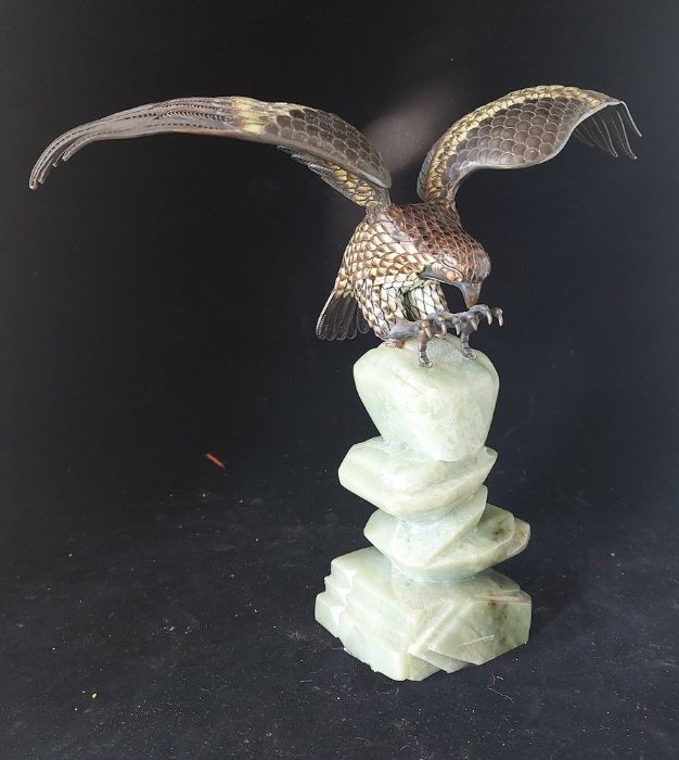 A 925 silver eagle with enamelled decoration, the onyx base modelled as rockwork, 26cm high - Image 2 of 4