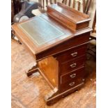 A late Victorian oak davenport desk, boxwood strung, stationary box on the top enclosing ink