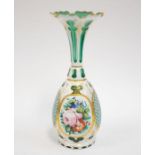 A late 19th century Bohemian overlay green glass vase with gilt detail and hand-painted panelling