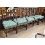 A set of five Sheraton style mahogany dining chairs, upholstered seats (2 armchairs, 3 side
