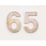 A pair of Asprey novelty silver numbers "5" and "6"., plain form, both marked Asprey and