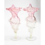 A pair of Victorian vaseline glass vases AF to base of trail to one