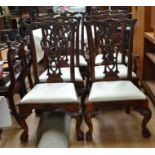 A set of six Chippendale style mahogany dining chairs with two carvers scuffs to frames and stains