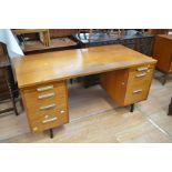 1960's teak pedestal desk along with a teak unit