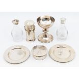 A collection of ecclesiastical communion silver ware, likely from one or more travelling sets.