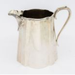 A Victorian silver handled milk jug, initialled to front, hallmarked London, 1866, Goldsmiths