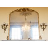 A 19th Century Rococo Revival gilt overmantle mirror with original pier glass, shell and foliage