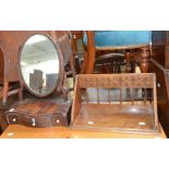 A mahogany George III swing/toilet mirror, together with a 19th century mahogany book rack with